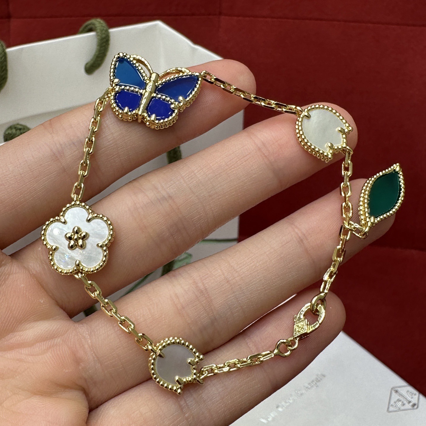 Colestore Van Cleef & Arpels Lucky Spring Butterfly bracelet, 5 motifs Yellow gold, Agate, Lapis Lazuli, Mother-of-pearl size 18.5cm