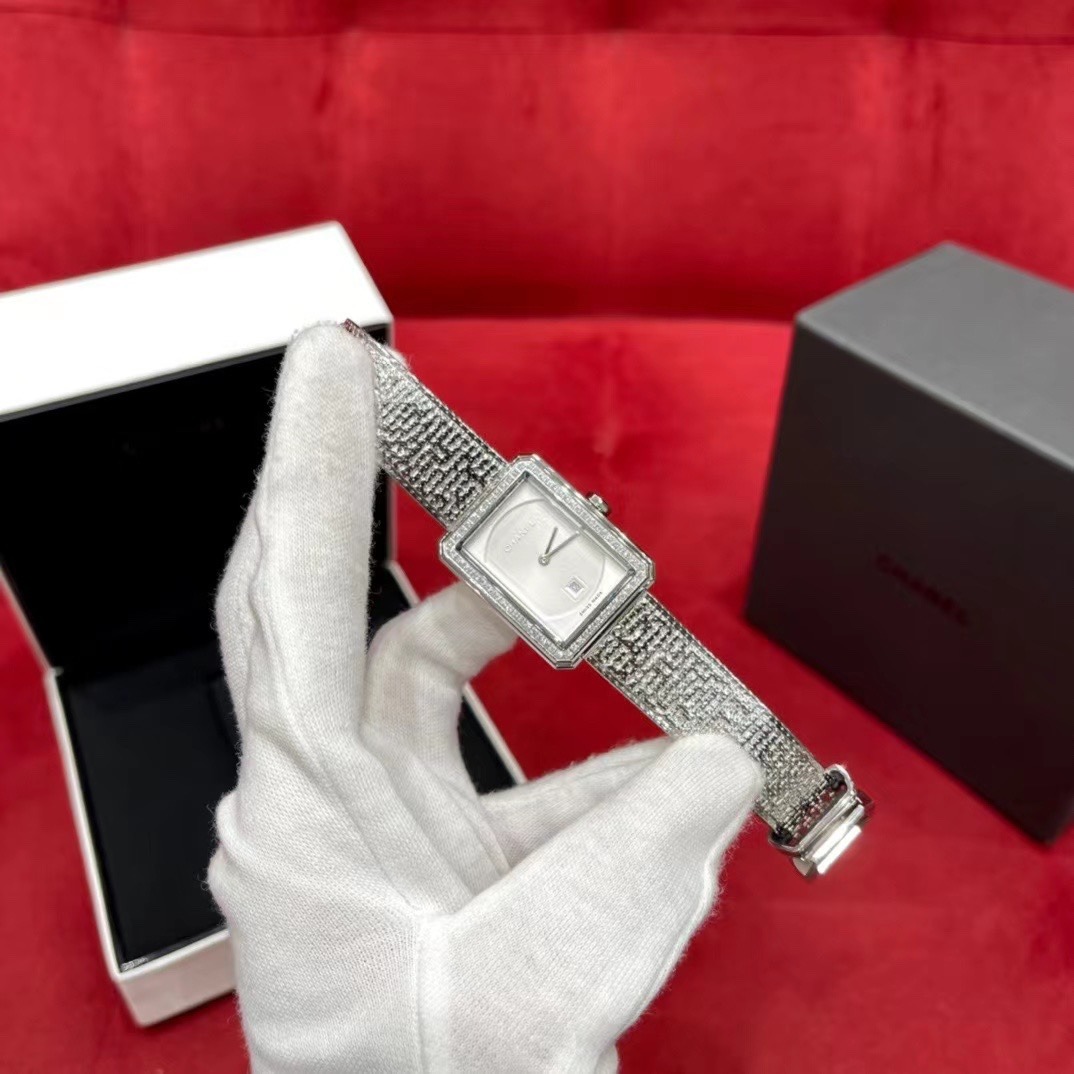 Colestore Chanel Boy-Friend Tweed Watch featuring a silver-tone strap and case
