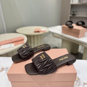 Colestore Miu Miu Matelassé nappa leather slides Briarwood