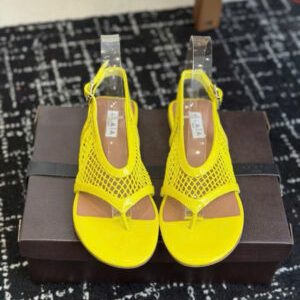Alaïa Flex Mesh Thong Sandals in Patent Leather